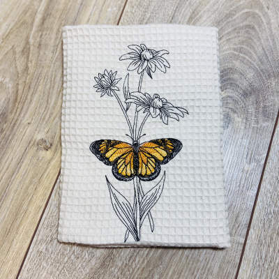 Kuchynská utierka/ uterák motýľ na kvete